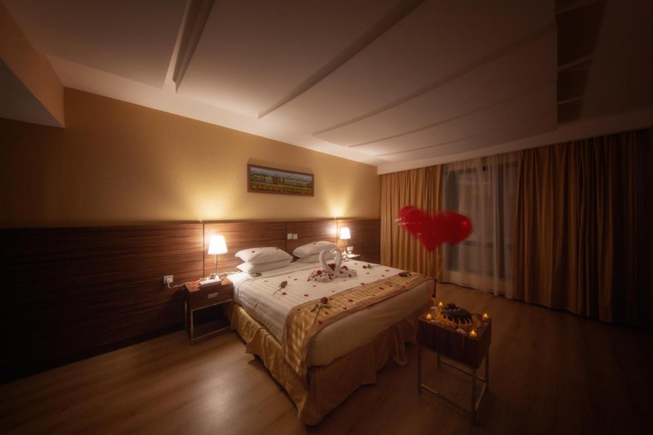 Al Safwah Orchid Hotel La Meca Exterior foto A bedroom at the hotel