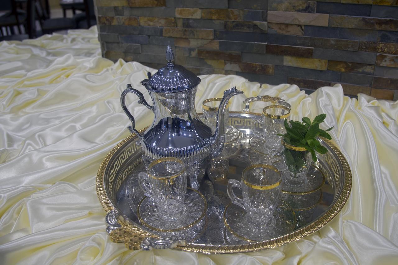 Al Safwah Orchid Hotel La Meca Exterior foto A silver tea set